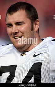 October 17, 2009: Iowa Hawkeyes wide receivers Derrell Johnson-Koulianos  (15) and Trey Stross (86) carry the Heartland Trophy off the field after an  NCAA football game against the Wisconsin Badgers at Camp