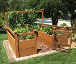 Garden boxes create ideal spaces for many types of plants to grow on a bed of soil that's elevated from the ground. Diy Raised And Enclosed Garden Bed The Garden