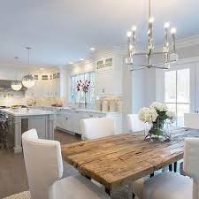 I Like The Rustic Table In Contrast To The Modern White Lines I Like Pendant Lighting But Perhaps Not These Specifically Sweet Home Home Kitchen Inspirations