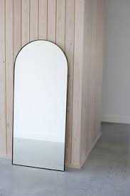Full length tall arched wall hung mirror with dark wood stain frame. 15 Arch Mirror Floor Ideas Arch Mirror Apartment Decor Bedroom Decor