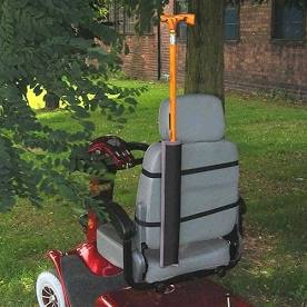 small quiver style bag attached to the back of a wheelchair