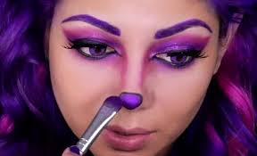 The blue caterpillar from alice in wonderland my 12 yr. How To Perfect The Cheshire Cat S Purple Makeup Look For Halloween Halloween Ideas Wonderhowto