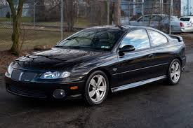 Image result for Dark Otter Gray 2004 Pontiac