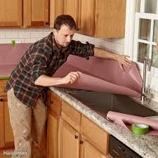 Use 320 grit sandpaper on dry cabinets to remove all of the excess paint or bumps. 20 Tips On How To Paint Kitchen Cabinets Family Handyman