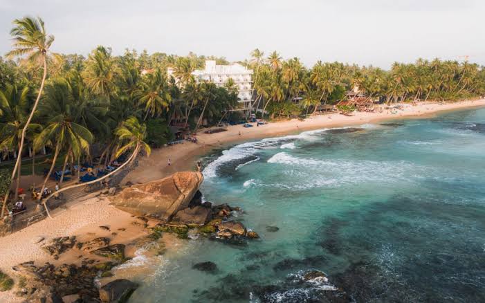 Dalawella Beach rope swing sea turtles snorkelling reef quiet south coast Unawatuna Sri Lanka