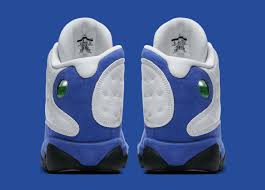 This Air Jordan 13 Comes Dressed In A White Hyper Royal And Black Colour Scheme Serving As A Rare Nod To Mj S Later Days With T Jordan 13 Air Jordans Jordans
