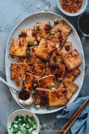 Crispy Marinated Tofu I Used Less Sodium Soy Sauce Sriracha Sauce Less Shaoxing Wine Pretty Good But Would Li Marinated Tofu Delicious Tofu Tofu Recipes