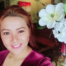 Grandmalola Rhea Cross added a...