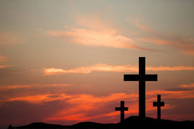 Three Wooden Crosses In Silhouette Stand Silently On A Hill At Cross Pictures Jesus Cross Wallpaper Cross Wallpaper