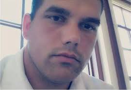 Why Facebook Kept Up Photos of a Marine's Bloody Suicide