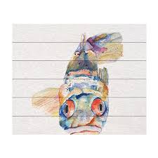 Inspired by coastal folk art and breezy beach house decor, this ceramic fish plate wall decor brings sunny shoreline style to your walls! Trademark Fine Art White Blue Fish Wood Slat Wall Art