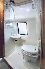 Rv Showers The Shower Can Be Used As A Sit Down Shower With The Door Closed Camper Bathroom Toilet Remodel Rv Bathroom