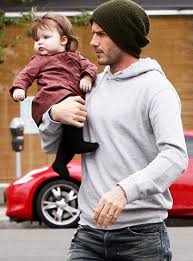David Beckham Style David Beckham Photos The Beckham Family David And Victoria Beckham