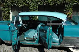 Image result for Turquoise 1958 Cadillac