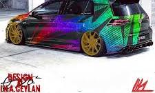 Custom Car Wrap Design with Yellow Rims and Gold Wheels