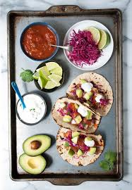 Toss finely chopped red cabbage with sour cream, salt, lime and chipotles in adobo sauce. Easy Fish Tacos