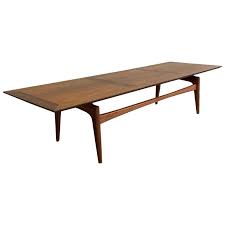 Mid Century Modern John Stuart Cherry And Walnut Floating Coffee Table In 2020 Modern Wood Coffee Table Mahogany Coffee Table Cherry Wood Coffee Table