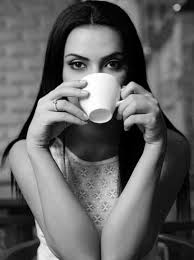 Black And White Woman Drinking Coffee Pin On The Eyes Of A Predator