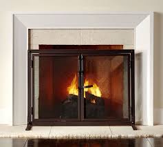 Drolet has a wide array of wood inserts. Industrial 44 Fireplace Screen With Doors Pottery Barn