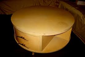 Whether you are looking for a wrought iron coffee table, travertine coffee table, or a live edge tree trunk coffee table, our catalog is the place for you. Eames Unusual 32 X 20 Blonde Round Rotating 3 Drawer Drum Coffee Table Collectors Weekly