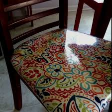Chairs Recovered In Fabric And Clear Vinyl What A Great Idea For Easy Clean Chairs For My Sloppy Spil Recovering Chairs Decor Hacks Diy Kitchen Chairs For Sale