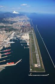 Genoa Airport Also Named Cristoforo Colombo Airport Is Built On An Artificial Peninsula 4 Nm West Of Genoa Italy It Airport Design Aerial Photography Scenic