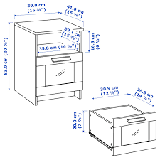Bedside tables are used to hold a variety of common bedroom items that include reading lamps, glass of water, books, phones and phone chargers, notebooks, candles, and small potted plants. Buy Brimnes Bedside Table White Online Uae Ikea