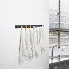In the winter months, scarves and hats easily hang off of the racks. Webi Coat Rack Wall Mounted Long Coat Hanger Wall Coat Hooks Wall Mounted Hook Rack 8 Hooks For Hanging Coats Clothes Jacket Hats Black Buy Online In Bahamas At Bahamas Desertcart Com Productid 54125486