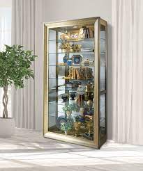 It seems like in the '90s, no house was complete without a display cabinet filled with tchotchkes. Philip Reinisch Co Vermeer Lighted Curio Cabinet Reviews Wayfair