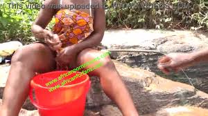 Hot and wild public fuck at the river between a bodybuilder and a neighbor  during laundry in Cameroon, Africa. to see exclusively on xvideos red watch  online