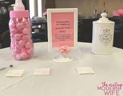 Guess The Number Of Gumballs In The Baby Bottle An Easy Baby Shower Game The Vintage Modern Wife