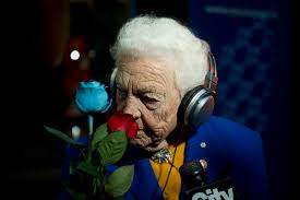 CARLOS OSORIO - Hazel McCallion smells flowers given to her as she celebrates at Mississauga City Hall ... - 6a00d8341bf8f353ef0133f57b0480970b-pi