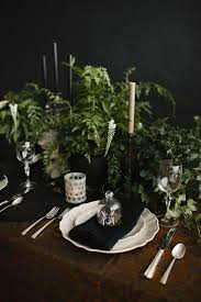 8 Bewitching Table Ideas For Your Halloween Bash Halloween Tablescape Halloween Table Settings Halloween Table Decorations