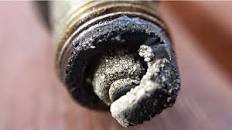 Image result for what are the symptoms of a fouled spark plug