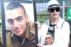 Mother of kidnapped soldier calls out at Gaza border: 'We're waiting for  you'