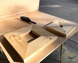 Drill holes of diameter 15mm at two places on each one of the wooden blocks in a way that the holes align with the earlier made 15mm holes on the table top plywood plank (see picture). Diy Round Kitchen Table Wooden Pedestal Base Abbotts At Home