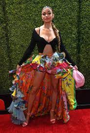 Madison bailey was born on january 29, 1999 in north carolina, usa. Fashion Shopping Style Madison Bailey Trades In Her Casual Surfer Girl Style For This Electrifying Versace Skirt Popsugar Fashion Photo 7