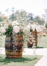 Vase of flowers wedding ceremony in park. 24 Outdoor Wedding Decoration Ideas Elegantwedding Ca