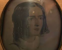 This is the The Elsie Inglis memorial in St Giles' Cathedral in Edinburgh.  "The Elsie Inglis memorial in the north choir aisle was designed by Frank  Mears and sculpted in rose-tinted French