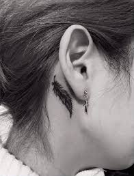 Bird Tattoo Behind Ear Meaning Feather Tattoo Meaning Types Designs Ideas Inspiration Feather Tattoo Meaning Behind Ear Tattoos Feather Tattoo Ear