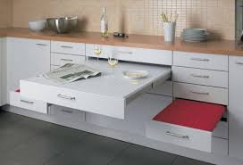 25 Space Saving Small Kitchens And Color Design Ideas For Small Spaces Small Apartment Kitchen Small Apartment Kitchen Table Kitchen Furniture Design