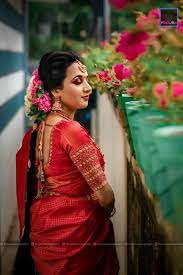 Pin By Lucky On Kerala Bridal Hairstyles Bridal Hairstyle Indian Wedding South Indian Bride Saree Kerala Bride