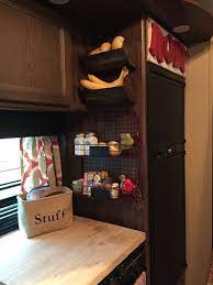 30 Creative Space Saving Ideas For Camper Kitchen Storage Rvstoragespacesaving Camper Organization Travel Trailers Camper Living Camping Trailer