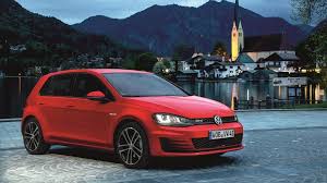 Free Wallpaper With Red Volkswagen Golf Gtd In The Background An Old German Town Located On The Lake Between The Mou Volkswagen Golf Volkswagen Volkswagen Car