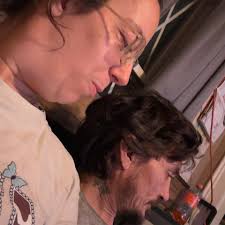 How to remove strong grip transfer tape from a dry erase board?