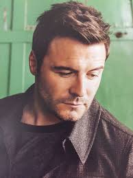 Trivago Guy Sean Borg with British TV Host Emma Ridley