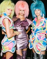 Using holograms, jerrica and her pals become jem and the holograms, battling other bands like the misfits and the stingers, to keep the starlight foundation going! Jeremy Scott Spring 2020 Beauty Jem And The Holograms Meets Nina Hagen Vogue