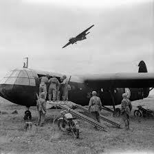 Airborne Troops Unloading Motorcycles From A Horsa Glider At Raf Netheravon December 1942 Another Glider Can Be Seen Overh Wwii History Gliders World War Two