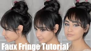 Comb it and wrap it around the base of the bun neatly. Get Kendall Jenner S Faux Bangs With This Genius Hair Tutorial