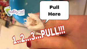 Dabbing rubbing alcohol on the bandage will slowly dissolve the adhesive. How To Remove A Bandage Stuck On Skin Youtube